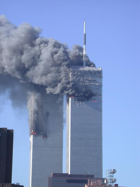 WTC Tower 1 on fire as flight UA175 impacts