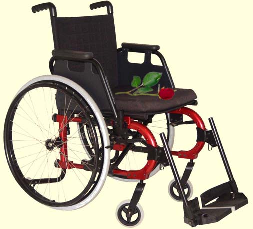 Picture of a wheelchair with a rose in the seat