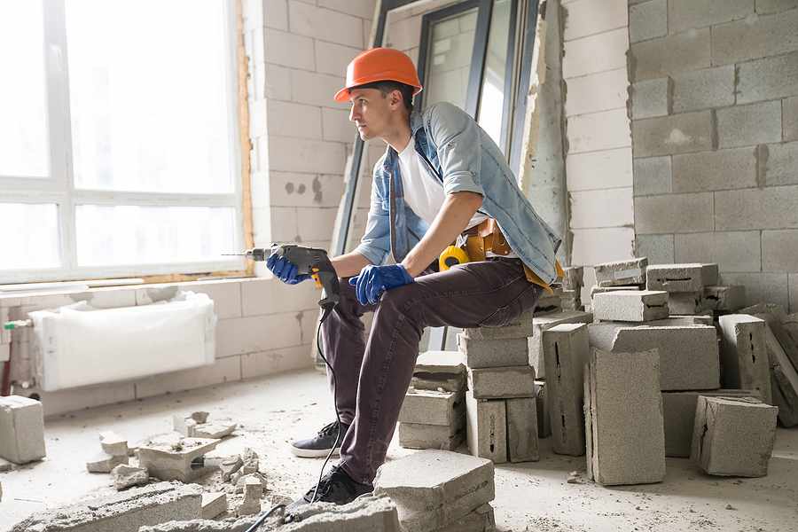 Young man renovating an apartment