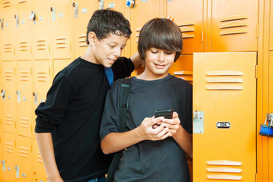 Two boys by their lockers