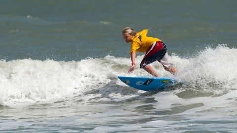 A grom on his board