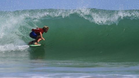 A grom riding wave