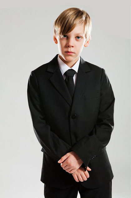 Boy dressed in suit
