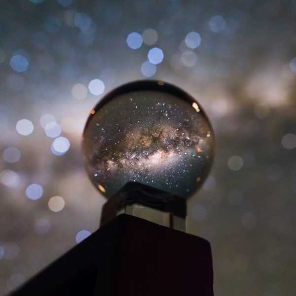 A crystal ball reflecting the Milky Way Galaxy
