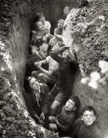 Children sheltering in a trench
