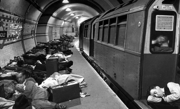 People bedded down in a tube station