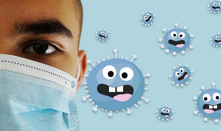 Student wearing medical mask, with viruses in background