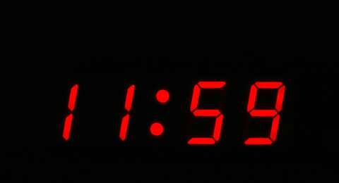 Digital clock reading 11:59