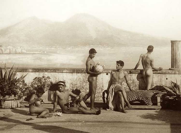 A group of young men and boys on a terrace